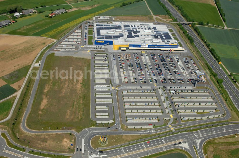 Würzburg from the bird's eye view: Blick auf das IKEA - Einrichtungshaus an der Autobahn A7 / B19 an der Mainfrankenhöhe 2 in 97078 Würzburg. View of the IKEA - furniture store on the highway A7 / B19 in 97078 Würzburg.