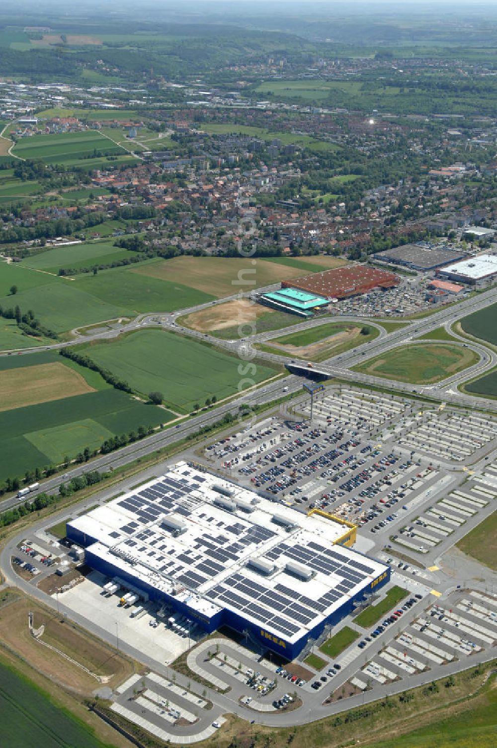 Würzburg from the bird's eye view: Blick auf das IKEA - Einrichtungshaus an der Autobahn A7 / B19 an der Mainfrankenhöhe 2 in 97078 Würzburg. View of the IKEA - furniture store on the highway A7 / B19 in 97078 Würzburg.