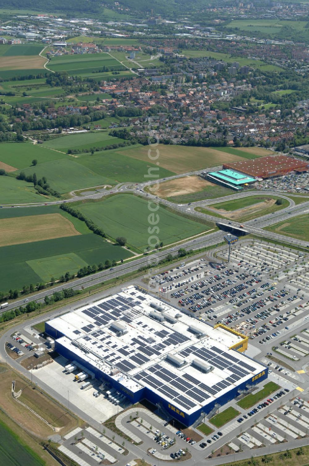 Aerial image Würzburg - Blick auf das IKEA - Einrichtungshaus an der Autobahn A7 / B19 an der Mainfrankenhöhe 2 in 97078 Würzburg. View of the IKEA - furniture store on the highway A7 / B19 in 97078 Würzburg.