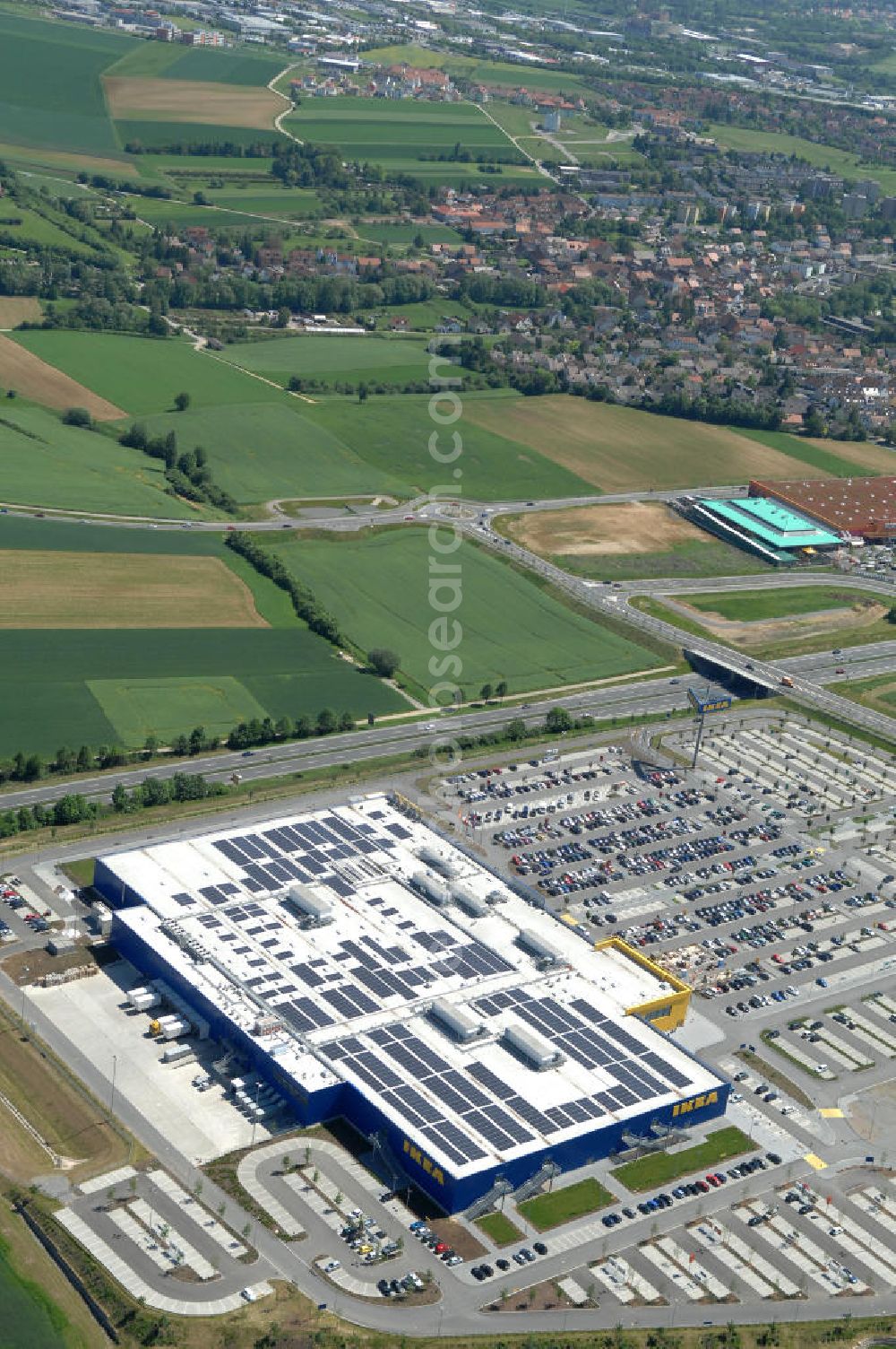 Aerial photograph Würzburg - Blick auf das IKEA - Einrichtungshaus an der Autobahn A7 / B19 an der Mainfrankenhöhe 2 in 97078 Würzburg. View of the IKEA - furniture store on the highway A7 / B19 in 97078 Würzburg.