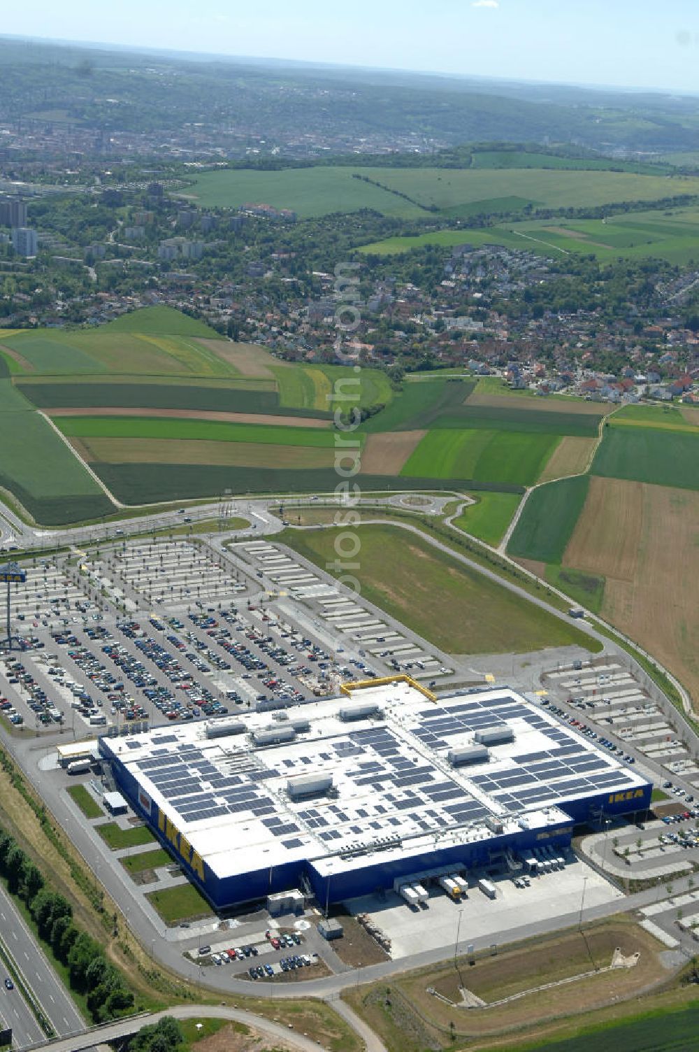 Würzburg from the bird's eye view: Blick auf das IKEA - Einrichtungshaus an der Autobahn A7 / B19 an der Mainfrankenhöhe 2 in 97078 Würzburg. View of the IKEA - furniture store on the highway A7 / B19 in 97078 Würzburg.