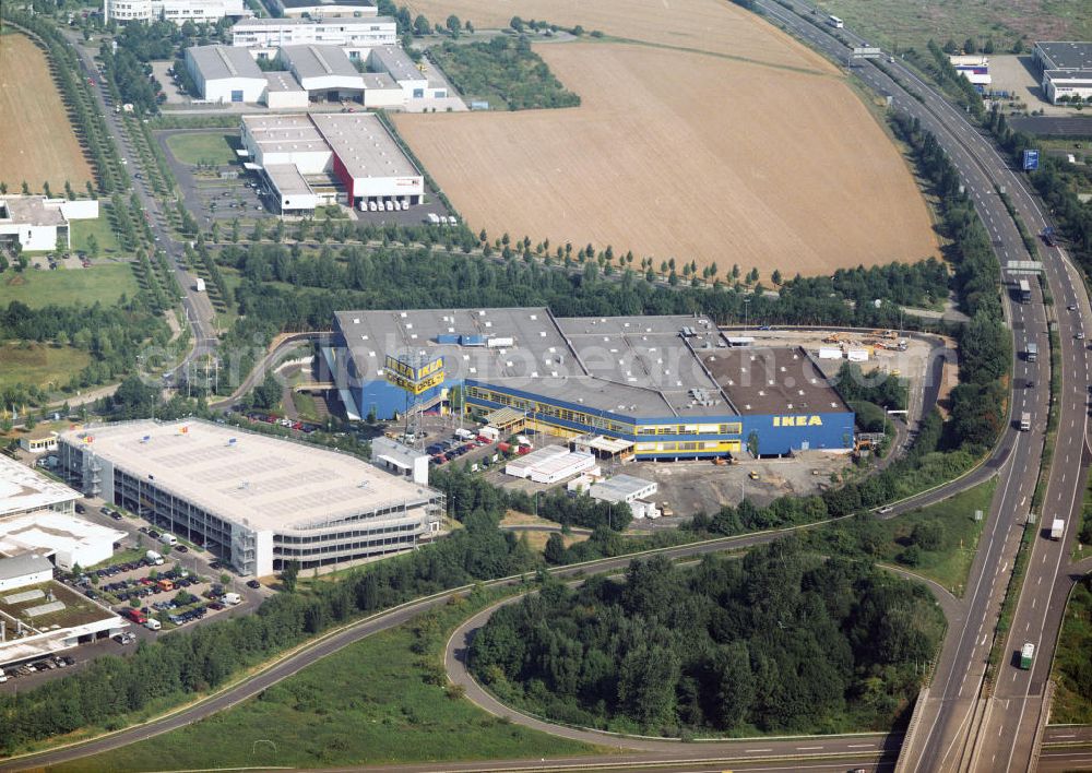 Kassel / Hessen from above - IKEA-Einrichtungshaus Kassel / Hessen an der Bundesautobahn A49 / Konrad-Zuse-Straße / Heinrich-Herz-Straße mit Parkhaus sowie der an die OPEL-Niederlassung Kassel vermietete Grundbesitz. IKEA Furniture store Kassel with a parking block and the OPEL car dealership Kassel at the motorway A 49.