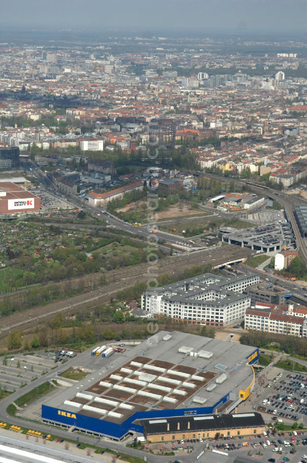 Aerial image Berlin - Blick auf das IKEA Einrichtungshaus im Gewerbegebiet in Berlin-Tempelhof. View of the furniture store IKEA in Berlin-Tempelhof.