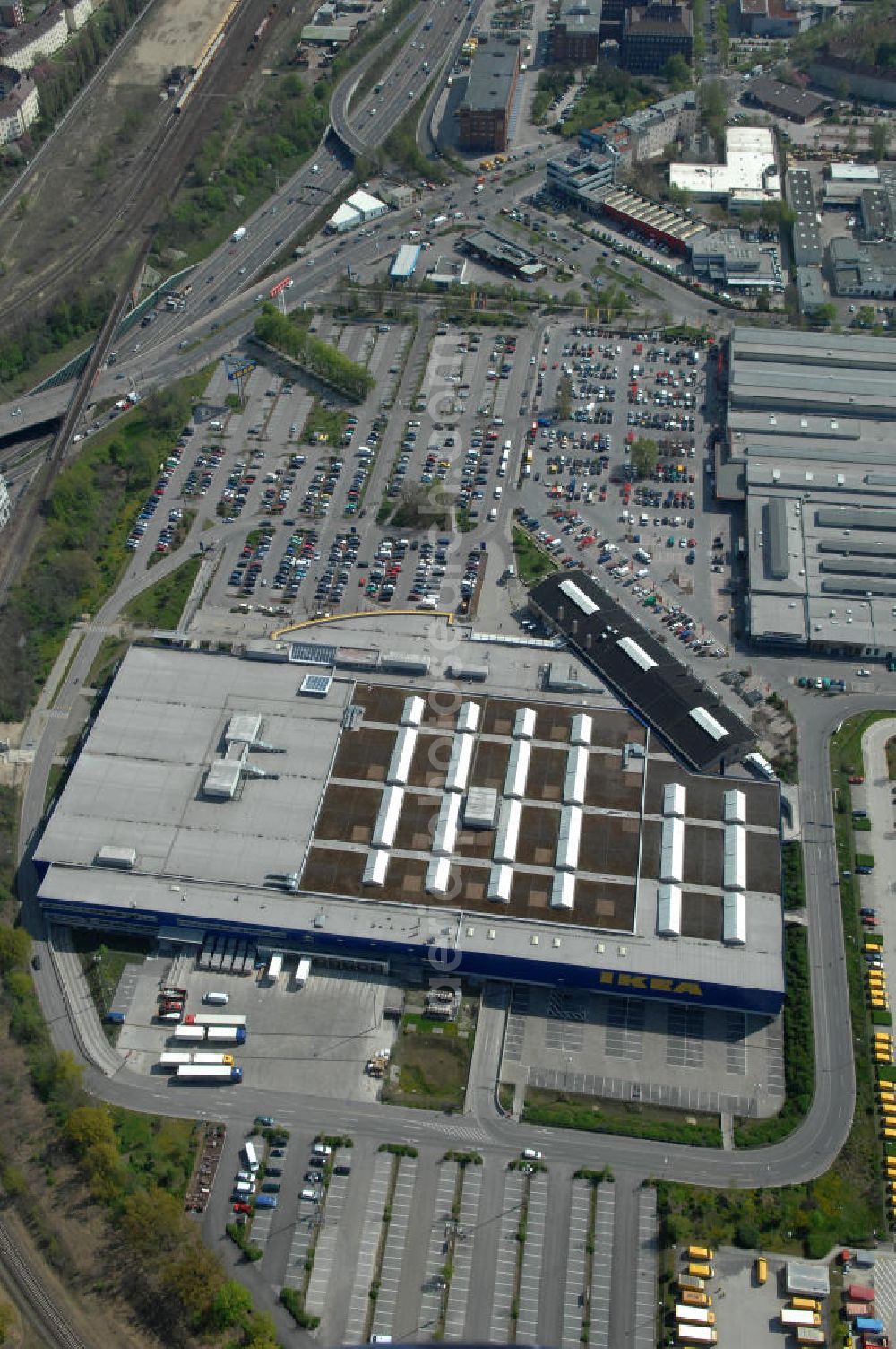 Berlin from the bird's eye view: Blick auf das IKEA Einrichtungshaus im Gewerbegebiet in Berlin-Tempelhof. View of the furniture store IKEA in Berlin-Tempelhof.