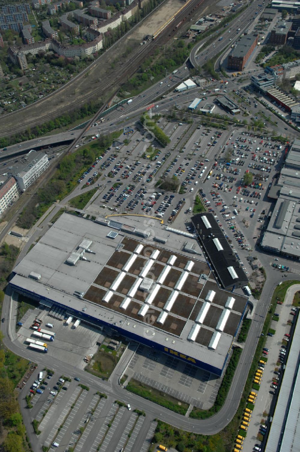 Aerial image Berlin - Blick auf das IKEA Einrichtungshaus im Gewerbegebiet in Berlin-Tempelhof. View of the furniture store IKEA in Berlin-Tempelhof.