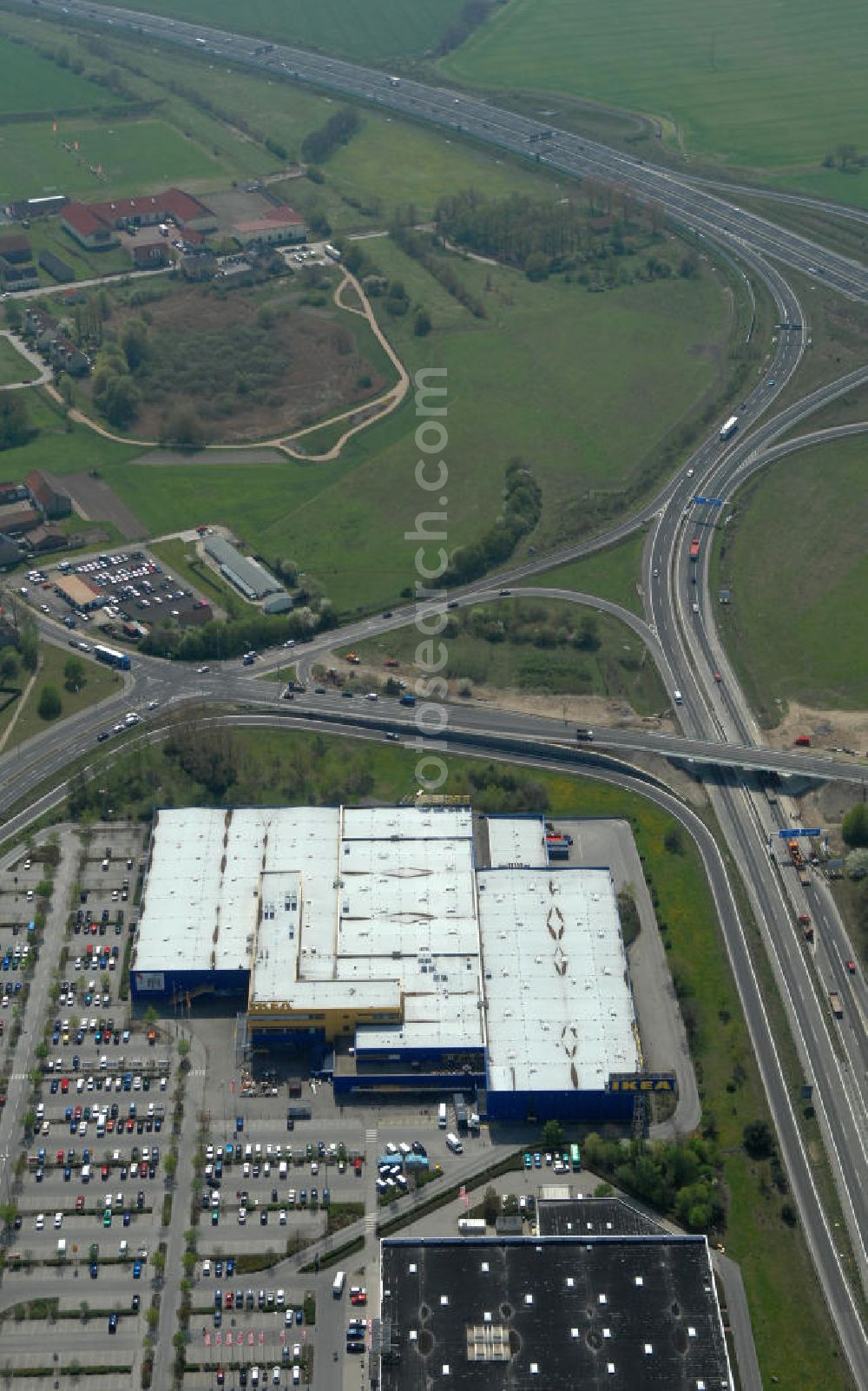 Waltersdorf from above - Blick auf das IKEA Einrichtungshaus im Gewerbegebiet Airport Center Waltersdorf in Berlin-Waltersdorf. View of the furniture store IKEA in Berlin-Waltersdorf.