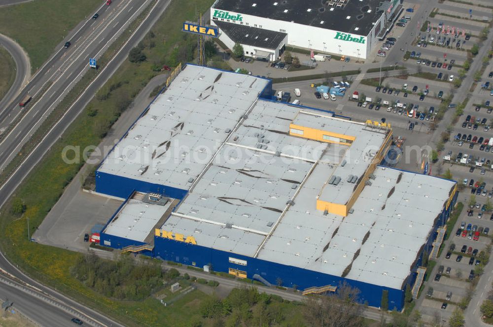 Waltersdorf from the bird's eye view: Blick auf das IKEA Einrichtungshaus im Gewerbegebiet Airport Center Waltersdorf in Berlin-Waltersdorf. View of the furniture store IKEA in Berlin-Waltersdorf.