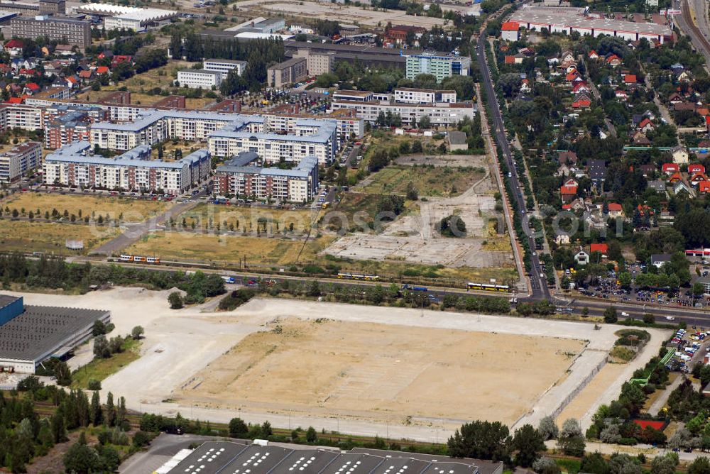 Aerial photograph Berlin - Blick auf das im Bau befindliche IKEA-Einrichtungshaus in Berlin-Lichtenberg. Diese Filiale soll mit 44.000 qm das zweitgrößte Einrichtungshaus des Konzerns werden. Es werden 60 Mio. Euro investiert. Adresse: IKEA Deutschland Verkaufs-GmbH, Am Wan dersmann 2-4. 65719 Hofheim-Wallau, Tel. +49 (0)0180 53534 35, Fax +49 (0)0180 53534 36, Email: ausk@memo.ikea.com