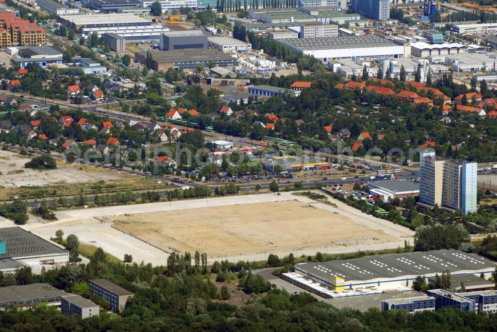 Aerial photograph Berlin - Blick auf das im Bau befindliche IKEA-Einrichtungshaus in Berlin-Lichtenberg. Diese Filiale soll mit 44.000 qm das zweitgrößte Einrichtungshaus des Konzerns werden. Es werden 60 Mio. Euro investiert. Adresse: IKEA Deutschland Verkaufs-GmbH, Am Wan dersmann 2-4. 65719 Hofheim-Wallau, Tel. +49 (0)0180 53534 35, Fax +49 (0)0180 53534 36, Email: ausk@memo.ikea.com