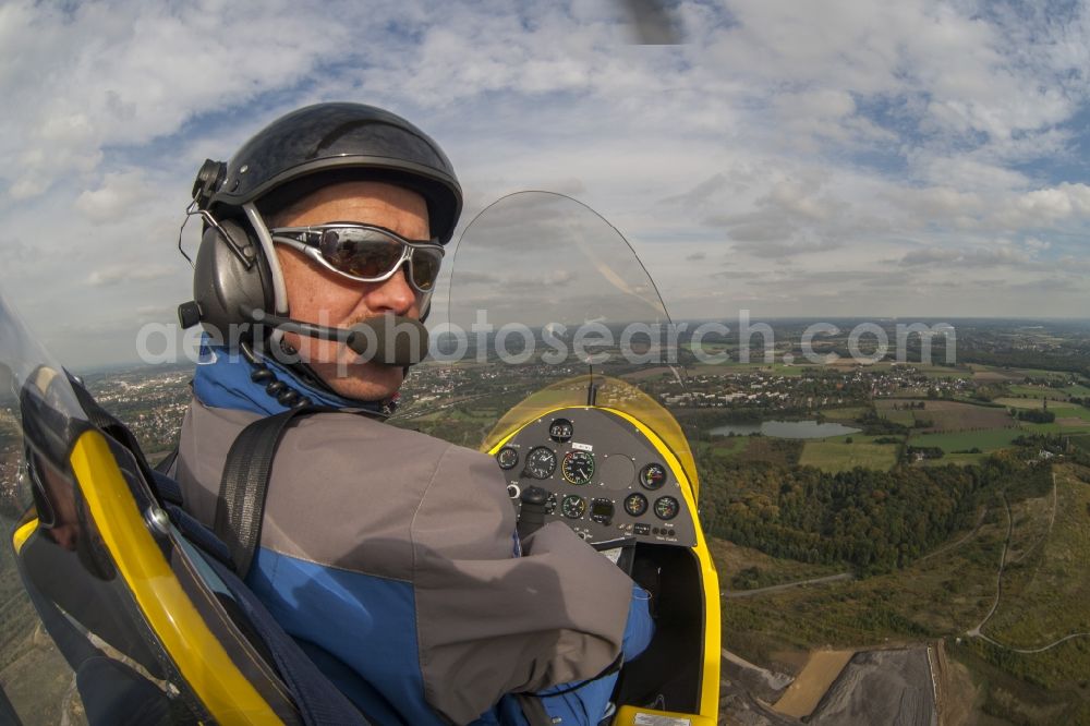 Dortmund from the bird's eye view: Fisheye view out of a gyrocopter in flight with the registration D-MCMD above the urban area of Dortmund in the federal state North Rhine-Westphalia