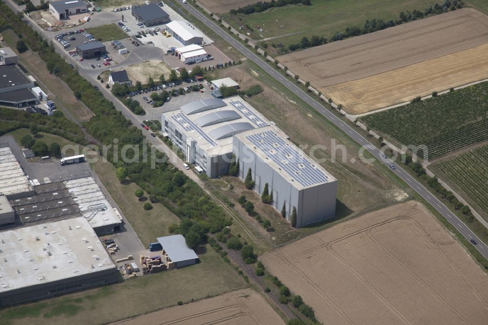 Alzey from the bird's eye view: Importhaus Wilms / Impuls GmbH & Co. KG in the industrial and commercial area Industriegebiet Ost in Alzey in the state Rhineland-Palatinate, Germany