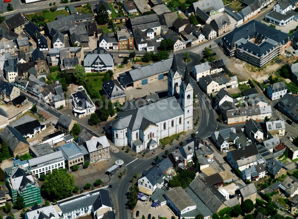 Polch from above - The Catholic Church of St. Stephen was built in 1849-1852 in the neo-Romanesque style. The twin towers are 50 meters high. It is located in the center of the village