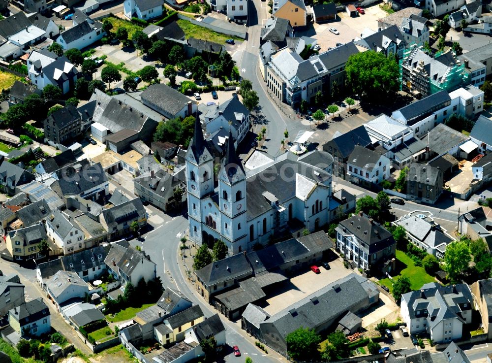 Polch from the bird's eye view: The Catholic Church of St. Stephen was built in 1849-1852 in the neo-Romanesque style. The twin towers are 50 meters high. It is located in the center of the village