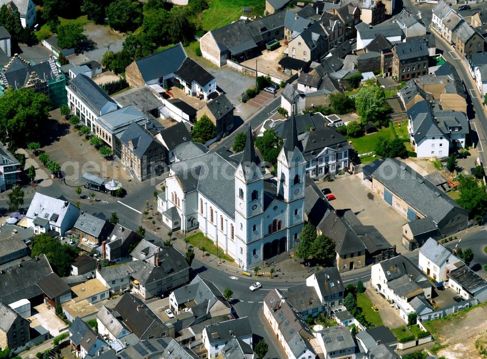 Aerial photograph Polch - The Catholic Church of St. Stephen was built in 1849-1852 in the neo-Romanesque style. The twin towers are 50 meters high. It is located in the center of the village