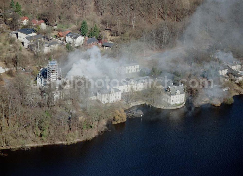 Berlin - Glienicke from the bird's eye view: Brand am Jagdschloß Glienicke gegen 15:00 Uhr . Das Jagdschloß wurde um 1683 im Auftrag des Großen Kurfürsten Friedrich Wilhelm errichtet und 1990 in die UNESCO-Liste des Weltkulturerbes aufgenommen.