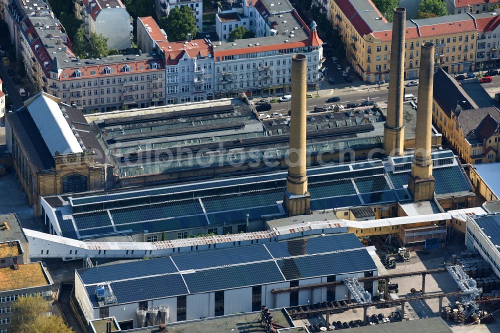 Berlin from the bird's eye view: Industrial monument of the technical plants and production halls of the Kabelwerk Oberspree (KWO) with Solarflaechen on the roof on Wilhelminenhofstrasse in Berlin, Germany