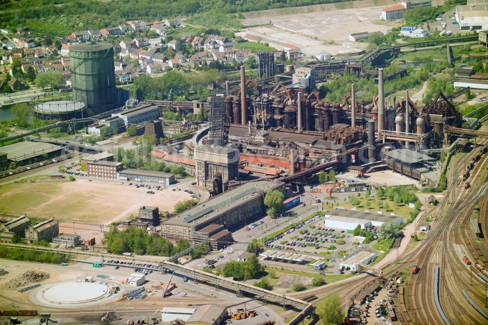 Völklingen from above - Industrial monument of the technical plants and production halls of the steelworks Weltkulturerbe Voelklinger Huette in Voelklingen in the state Saarland, Germany