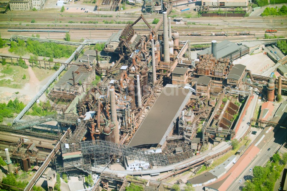 Völklingen from above - Industrial monument of the technical plants and production halls of the steelworks Weltkulturerbe Voelklinger Huette in Voelklingen in the state Saarland, Germany