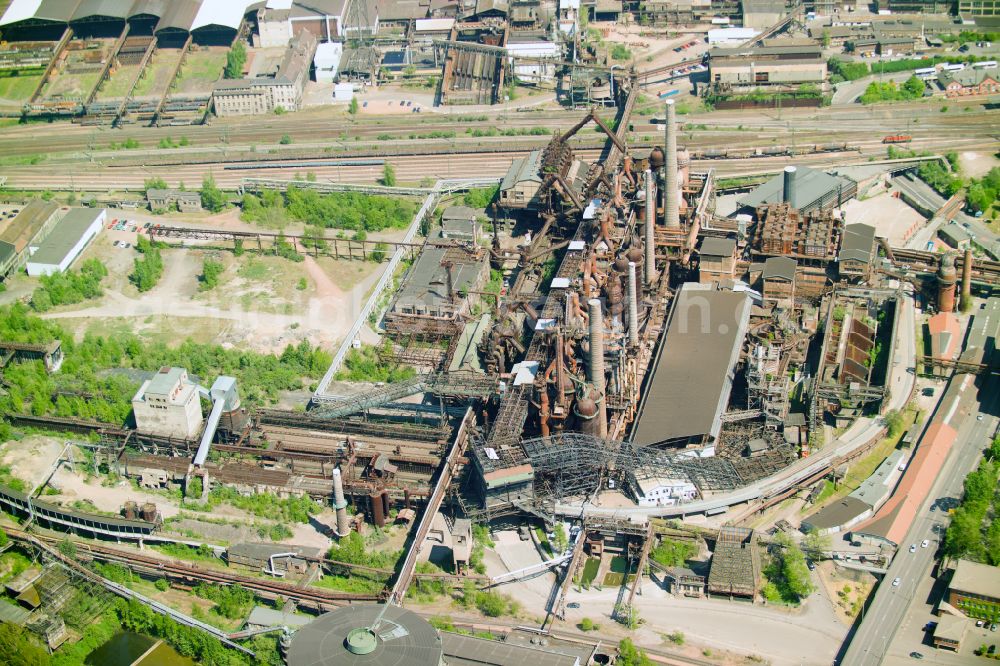 Völklingen from the bird's eye view: Industrial monument of the technical plants and production halls of the steelworks Weltkulturerbe Voelklinger Huette in Voelklingen in the state Saarland, Germany