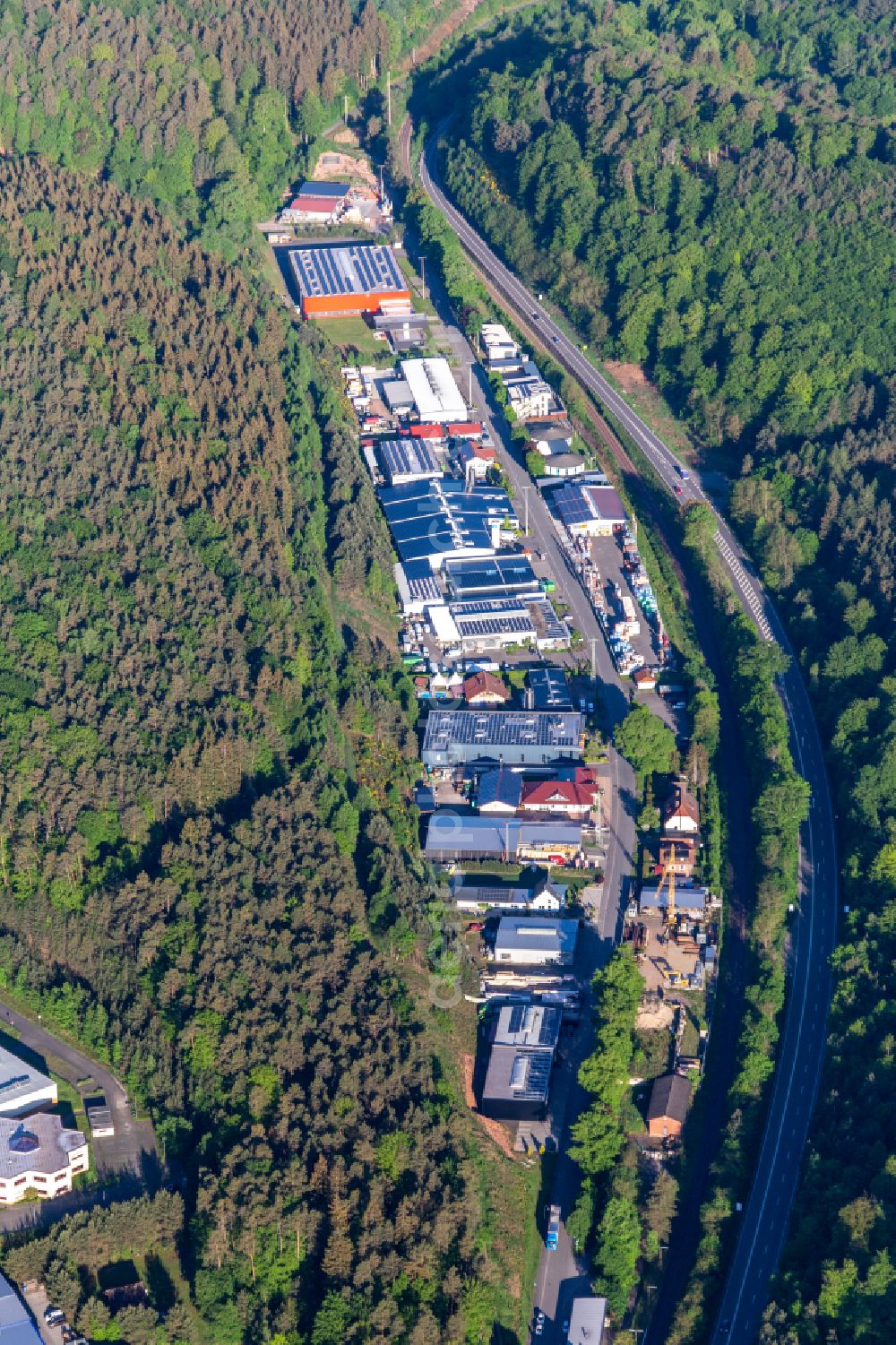 Aerial image Hauenstein - Industrial and commercial area on alten Bundestrasse in Hauenstein in the state Rhineland-Palatinate, Germany