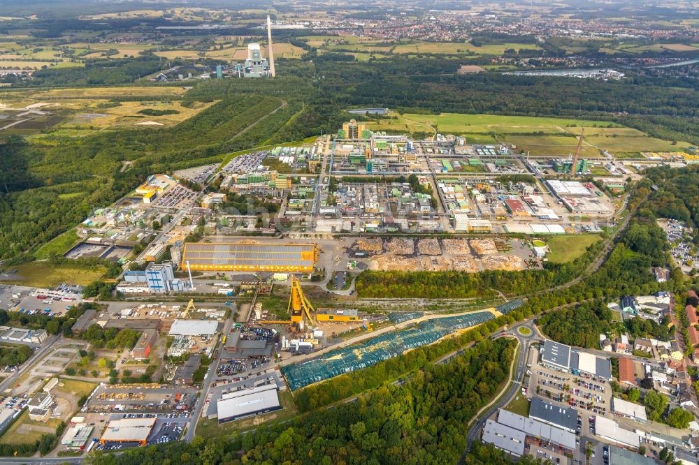 Bergkamen from above - Industrial and commercial area overlooking the buildings and production halls on the work premises of the chemical producer TERRITORY CTR GmbH and the recycling center Holzkontor Bergkamen GmbH & Co. KG on Ernst-Schering-Strasse in Bergkamen in the state North Rhine-Westphalia, Germany