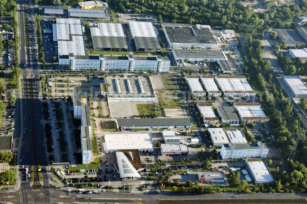 Berlin from the bird's eye view: Industrial and commercial area Rhinstrasse - Allee der Kosmonauten destrict Marzahn in Berlin