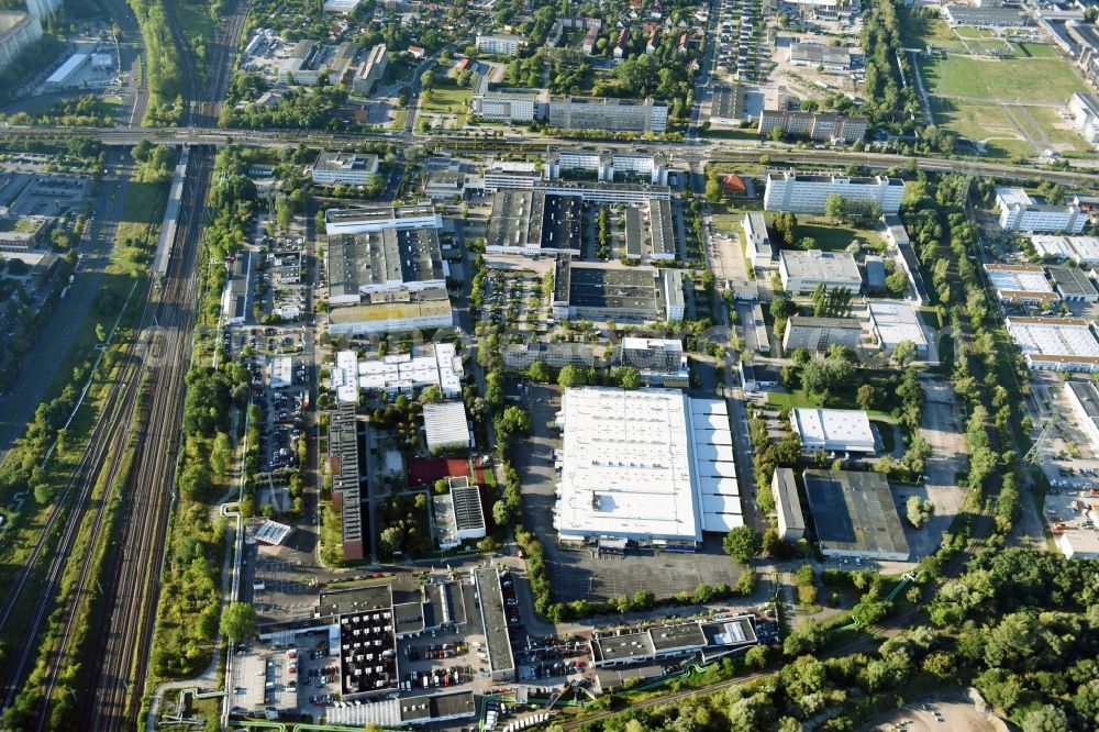 Berlin from the bird's eye view: Industrial and commercial area Rhinstrasse - Allee der Kosmonauten destrict Marzahn in Berlin