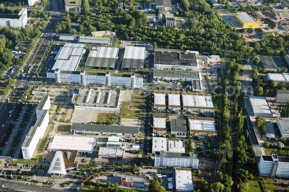 Berlin from the bird's eye view: Industrial and commercial area Rhinstrasse - Allee der Kosmonauten destrict Marzahn in Berlin