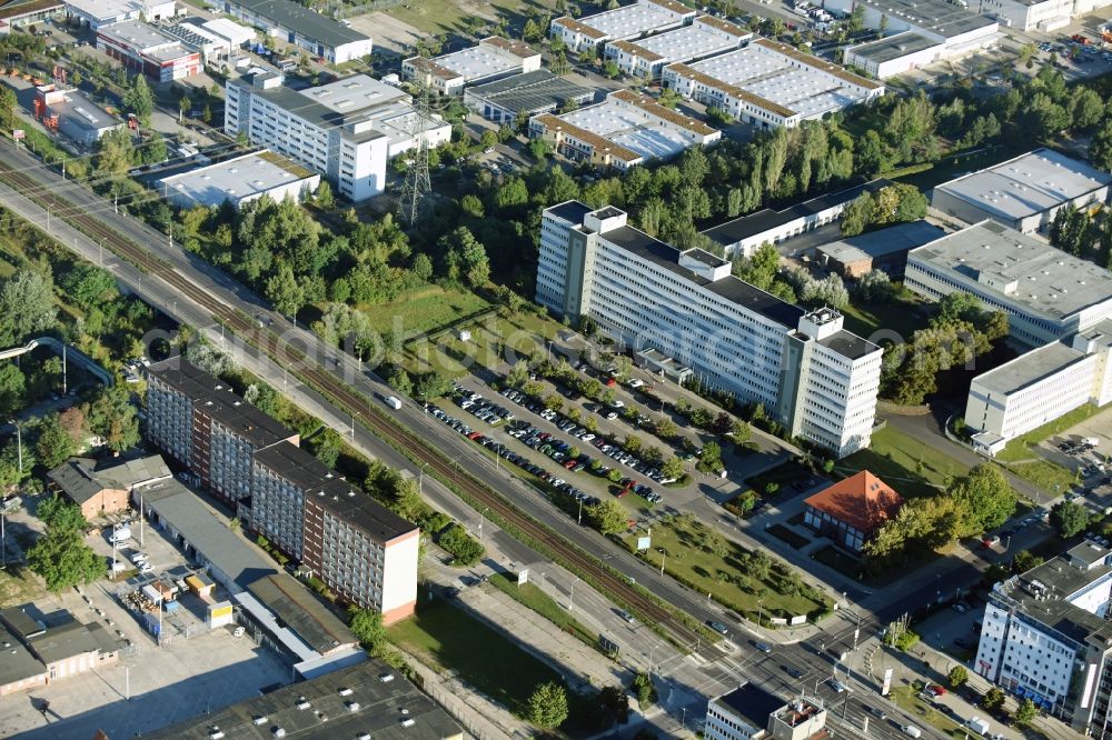 Berlin from the bird's eye view: Industrial and commercial area Rhinstrasse - Allee der Kosmonauten destrict Marzahn in Berlin