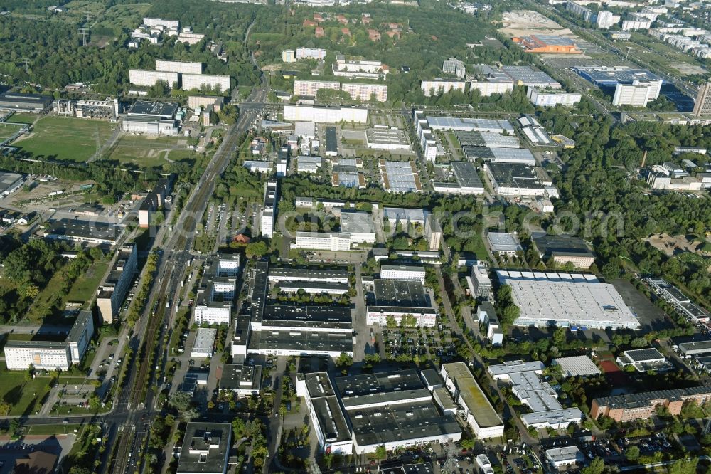 Berlin from the bird's eye view: Industrial and commercial area Rhinstrasse - Allee der Kosmonauten destrict Marzahn in Berlin