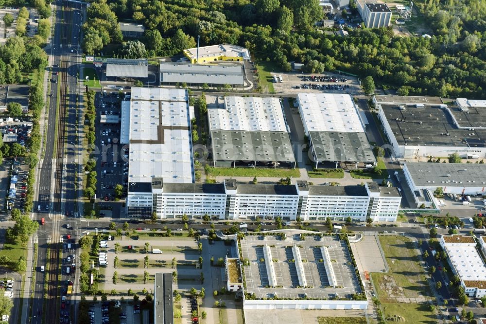 Berlin from the bird's eye view: Industrial and commercial area Rhinstrasse - Allee der Kosmonauten destrict Marzahn in Berlin