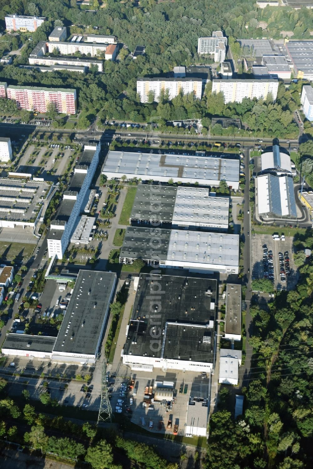 Berlin from the bird's eye view: Industrial and commercial area Rhinstrasse - Allee der Kosmonauten destrict Marzahn in Berlin