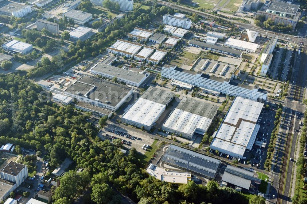 Berlin from the bird's eye view: Industrial and commercial area Rhinstrasse - Allee der Kosmonauten destrict Marzahn in Berlin