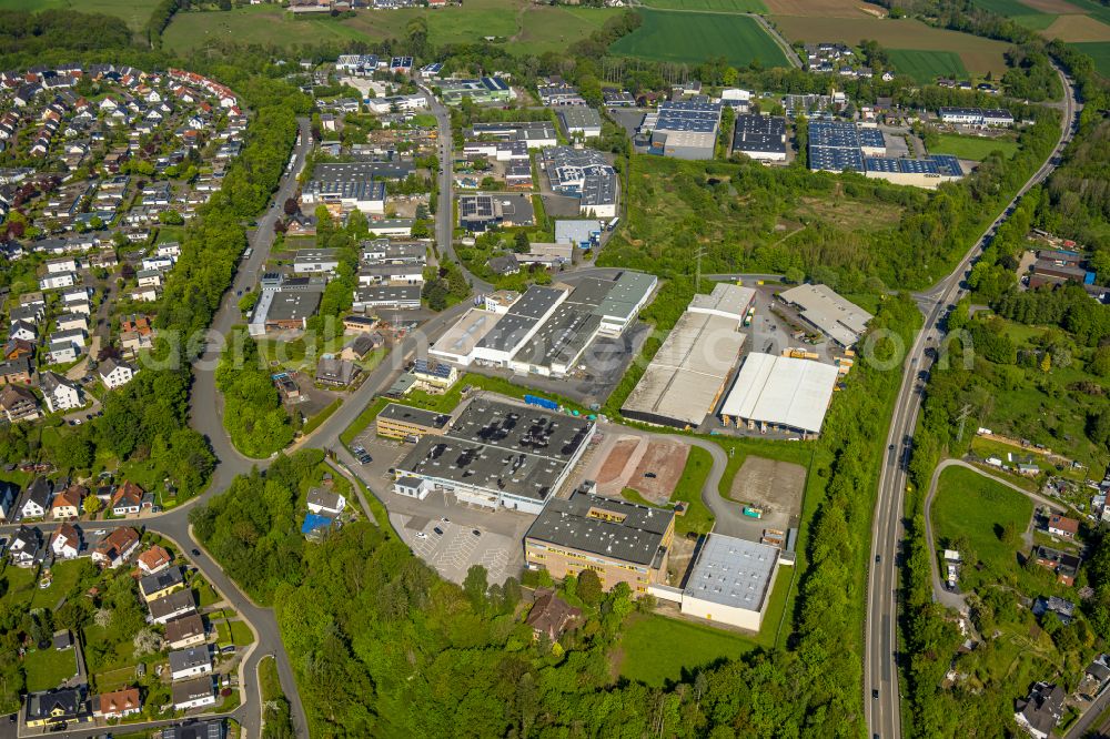 Arnsberg from the bird's eye view: Industrial and commercial area on Donnerfeld in the district Neheim in Arnsberg at Sauerland in the state North Rhine-Westphalia, Germany