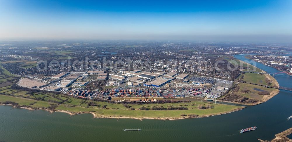 Duisburg from the bird's eye view: Industrial and commercial area along the Bliersheimer Strasse - Bismarckstrasse - Osloer Strasse - Europaallee overlooking the container port in Duisburg at Ruhrgebiet in the state North Rhine-Westphalia, Germany