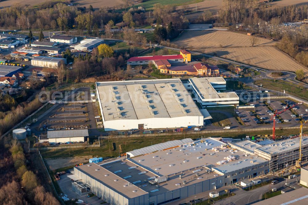 Hagenbach from the bird's eye view: Industrial and commercial area Faurecia Innenraum Systeme GmbH on street Faureciastrasse in Hagenbach in the state Rhineland-Palatinate, Germany