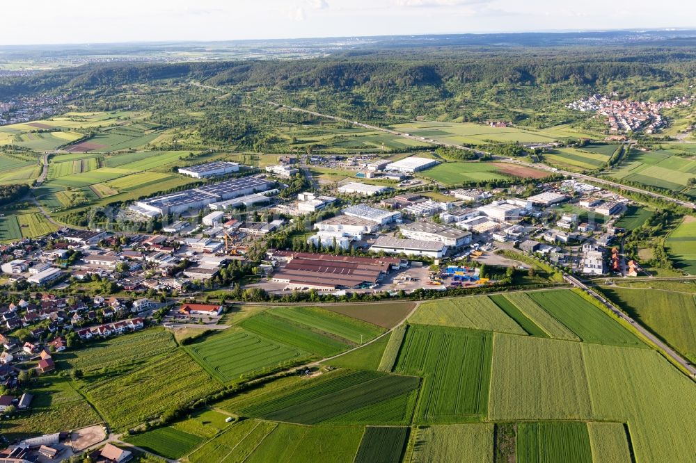 Herrenberg from the bird's eye view: Industrial and commercial area with FUXTEC GmbH, Wackenhut GmbH & Co. KG and PHOENIX CONTACT Connector Technology GmbH in the district Gueltstein in Herrenberg in the state Baden-Wurttemberg, Germany