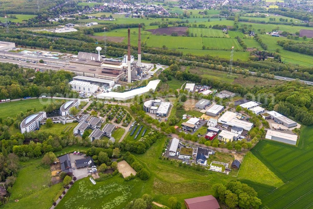 Gladbeck from the bird's eye view: Industrial and commercial area Am Wiesenbusch in Gladbeck at Ruhrgebiet in the state North Rhine-Westphalia, Germany