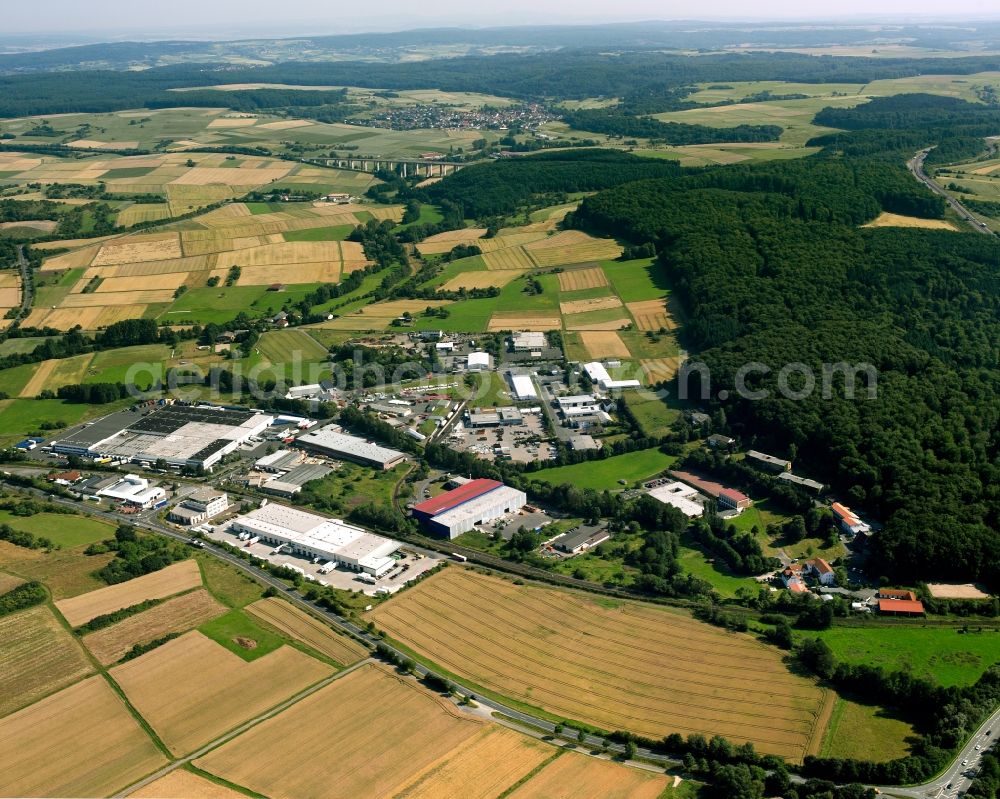 Großen-Buseck from the bird's eye view: Industrial and commercial area in Großen-Buseck in the state Hesse, Germany