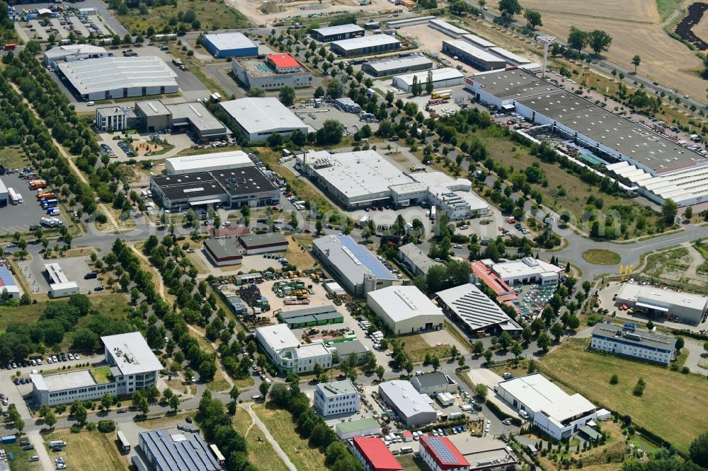 Aerial image Hoppegarten - Industrial and commercial area along the Industriestrasse - Gewerbestrasse in Hoppegarten in the state Brandenburg, Germany