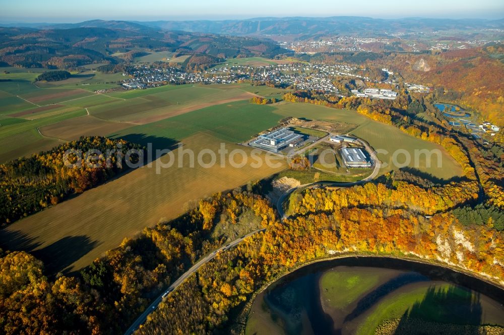 Aerial photograph Finnentrop - Industrial and commercial area industrial park Wiethfeld in Finnentrop in the state of North Rhine-Westphalia. The park is home to MFP and is surrounded by fields