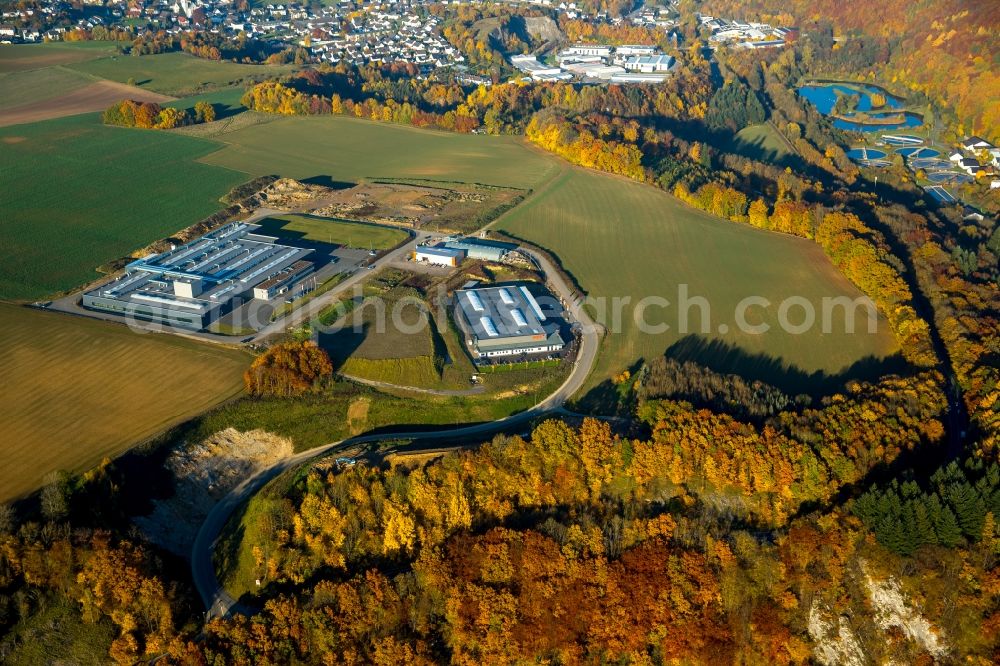 Finnentrop from above - Industrial and commercial area industrial park Wiethfeld in Finnentrop in the state of North Rhine-Westphalia. The park is home to MFP and is surrounded by fields