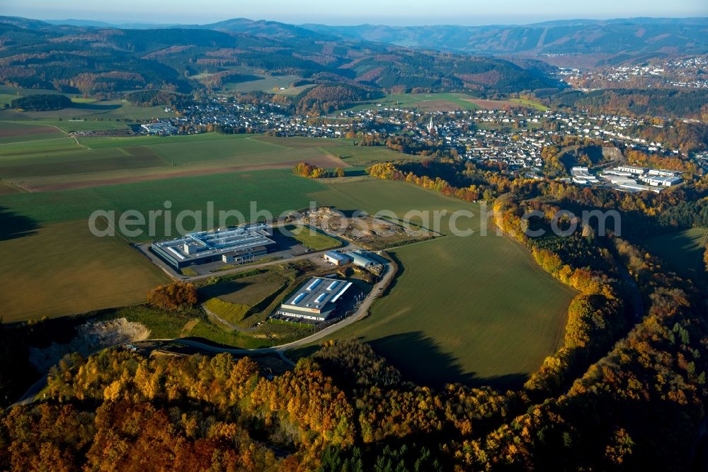 Finnentrop from the bird's eye view: Industrial and commercial area industrial park Wiethfeld in Finnentrop in the state of North Rhine-Westphalia. The park is home to MFP and is surrounded by fields