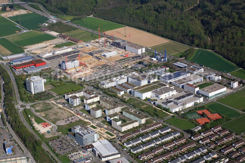 Kaiseraugst from above - The location of the company Roche in Kaiseraugst in Switzerland is extended. On the grounds are also the buildings of the DSM