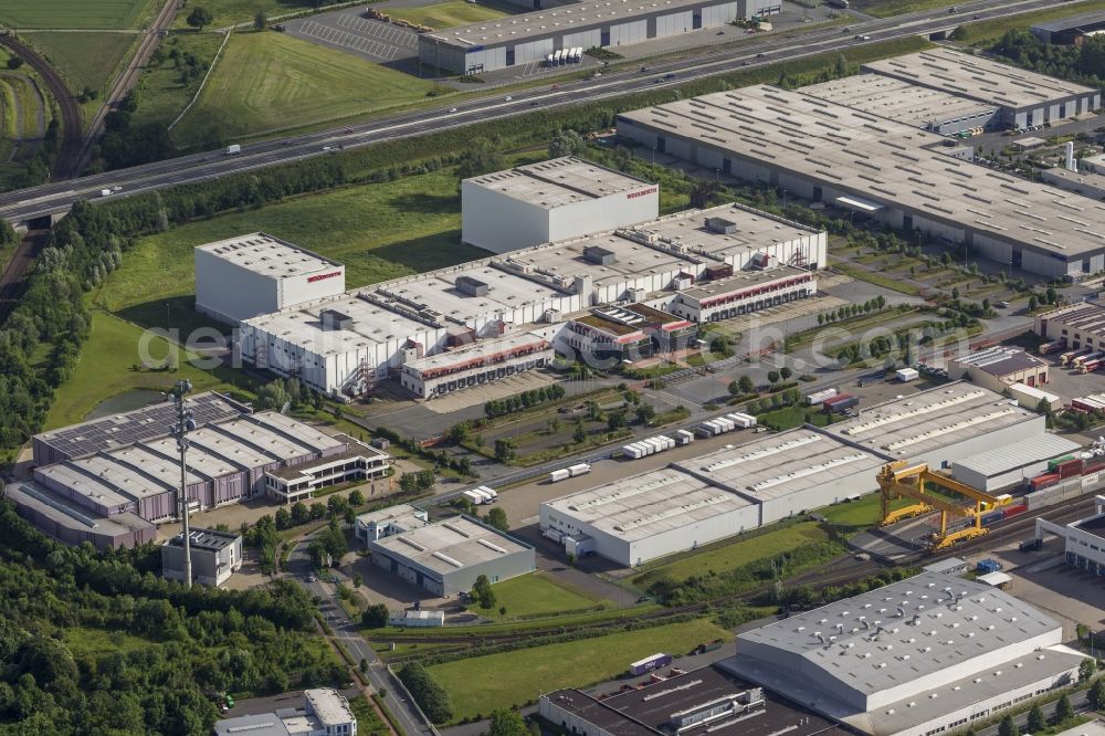 Bönen from above - View at the industrial and commercial area Am Mersch in the district Westerbönen in Bönen in the federal state of North Rhine-Westphalia NRW. The commercial area is part of the so-called INLOGPARC of the central logistics facility in the eastern Ruhr area. Operator is the Economic Development District of Unna