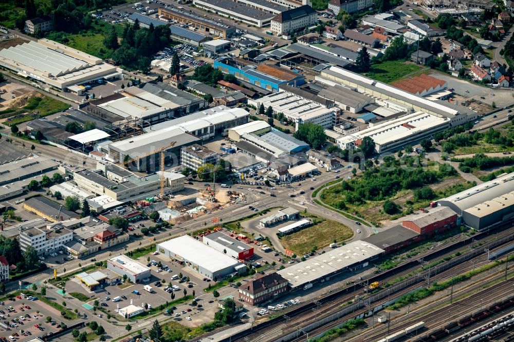 Offenburg from the bird's eye view: Industrial and commercial area Okenstrasse in Offenburg in the state Baden-Wuerttemberg, Germany