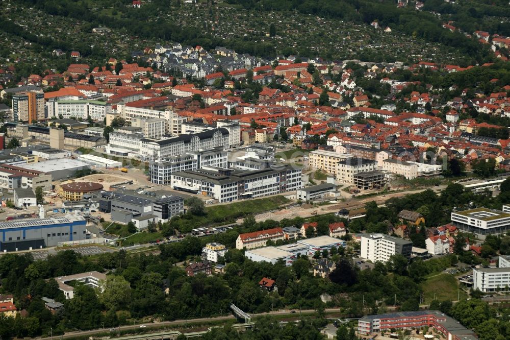 Aerial image Jena - Industrial and commercial area overlooking the works premises and the production buildings of the SCHOTT AG on Otto-Schott-Strasse in the district Lichtenhain in Jena in the state Thuringia, Germany