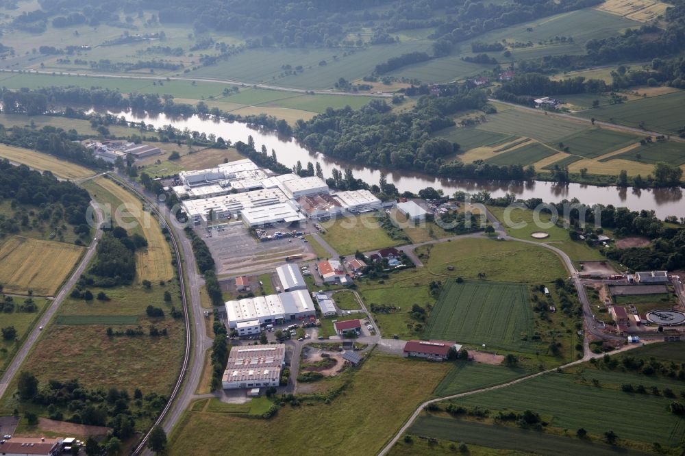 Dorfprozelten from the bird's eye view: Industrial and commercial area Magna Mirrors GmbH in the district Wildensee in Dorfprozelten in the state Bavaria