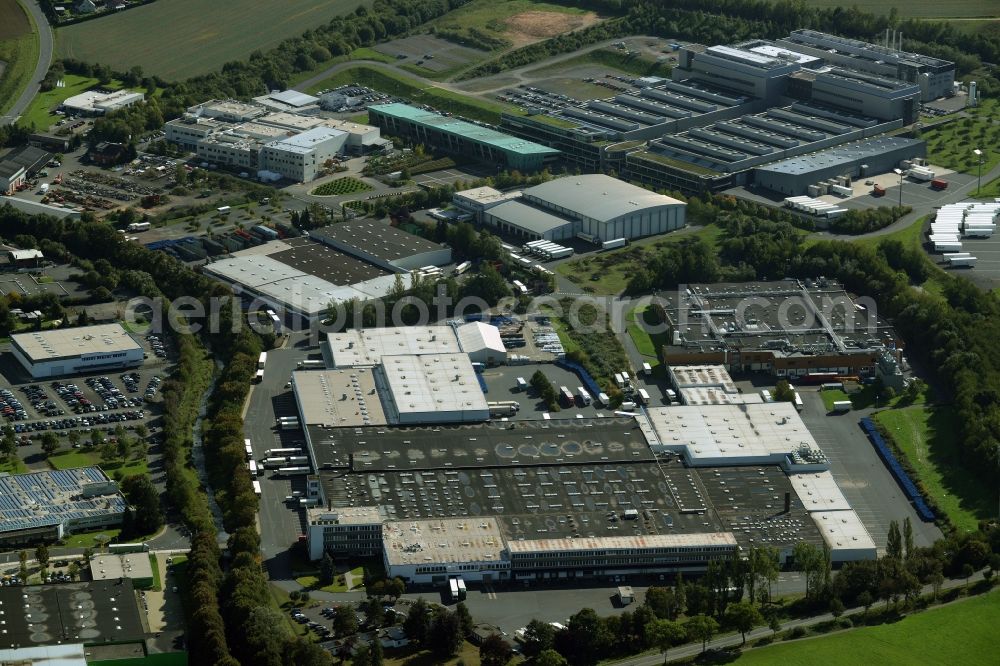 Aerial image Melsungen - Industrial and commercial area Pfieffewiesen in Melsungen in the state of Hesse. A logistics and cargo center of EDEKA is located here