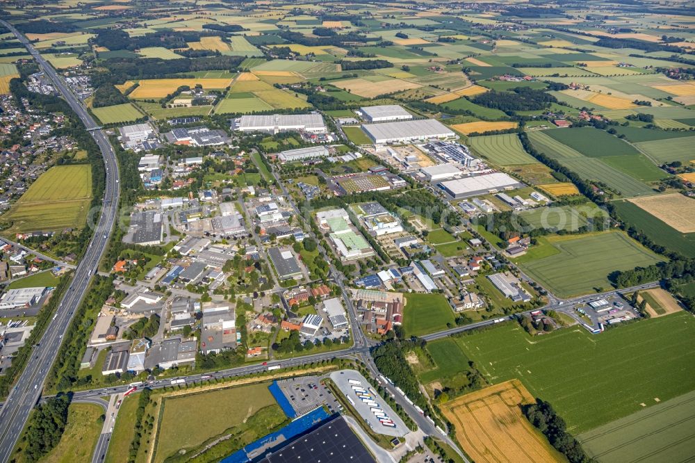 Rhynern from the bird's eye view: Industrial and commercial area along the BAB A2 in Rhynern in the state North Rhine-Westphalia, Germany